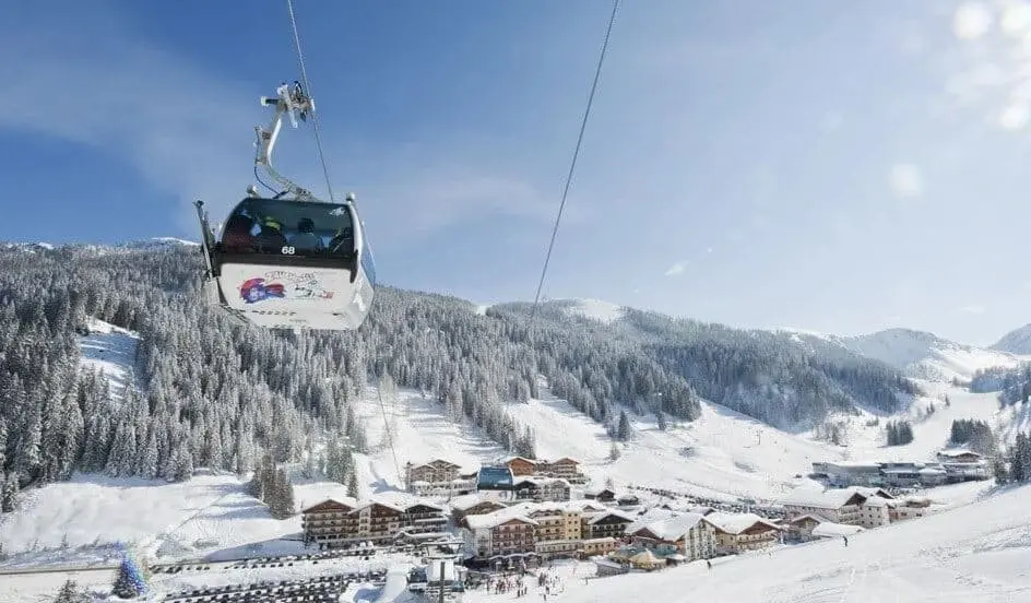 Zauchensee ski resort, gondola and snow-covered Alpine pistes